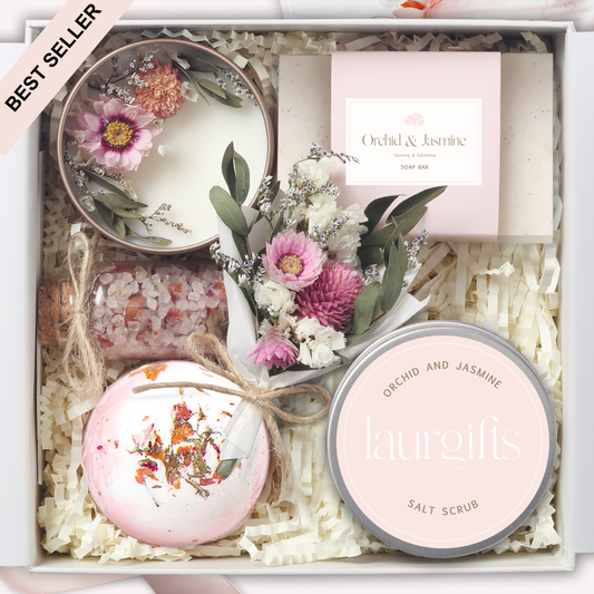 Mother’s Day spa gift box with orchid and jasmine candle, soap, bath bomb, bath salt, scrub, and mini dried flowers