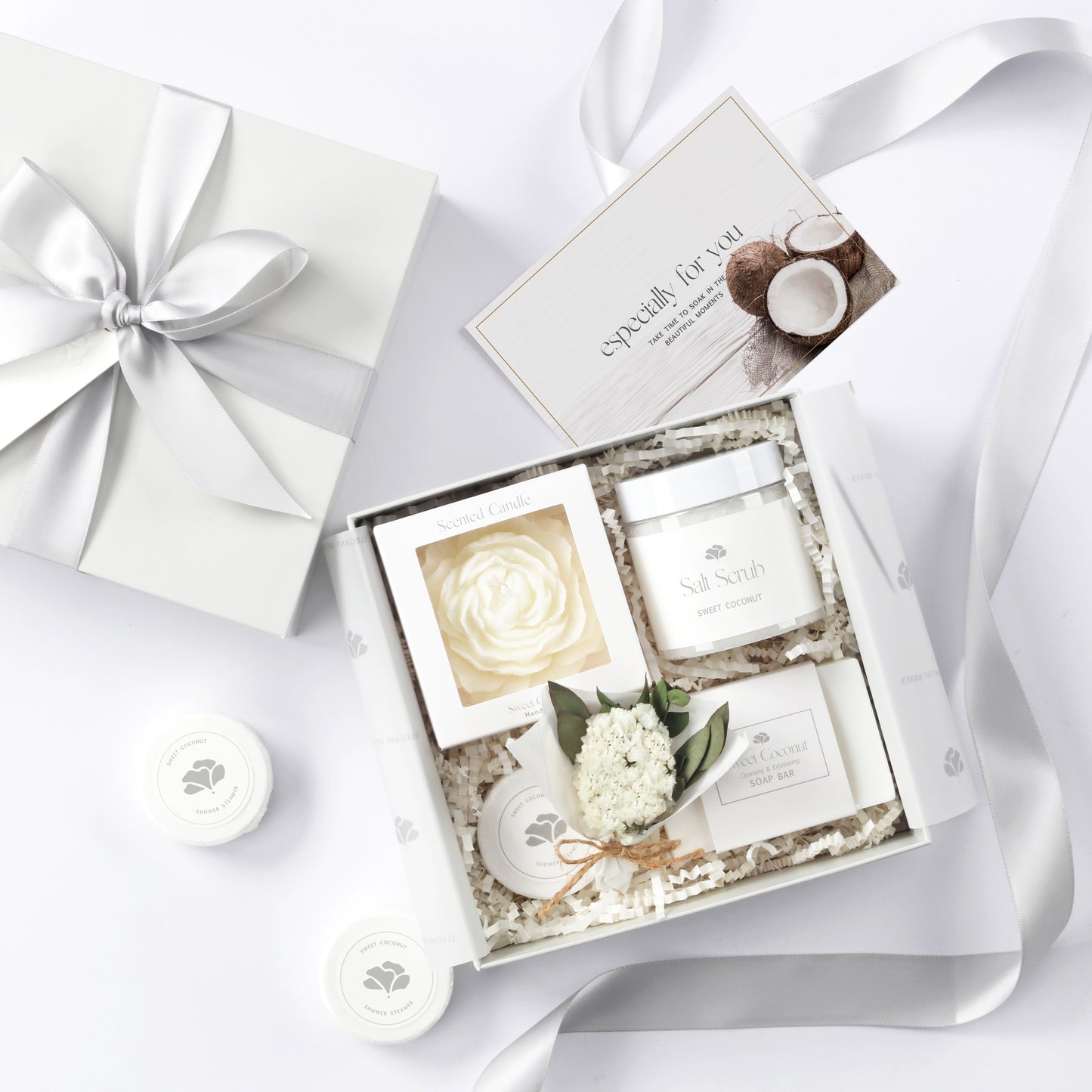 Elegant sweet coconut spa gift box with dried flowers and tropical-inspired packaging