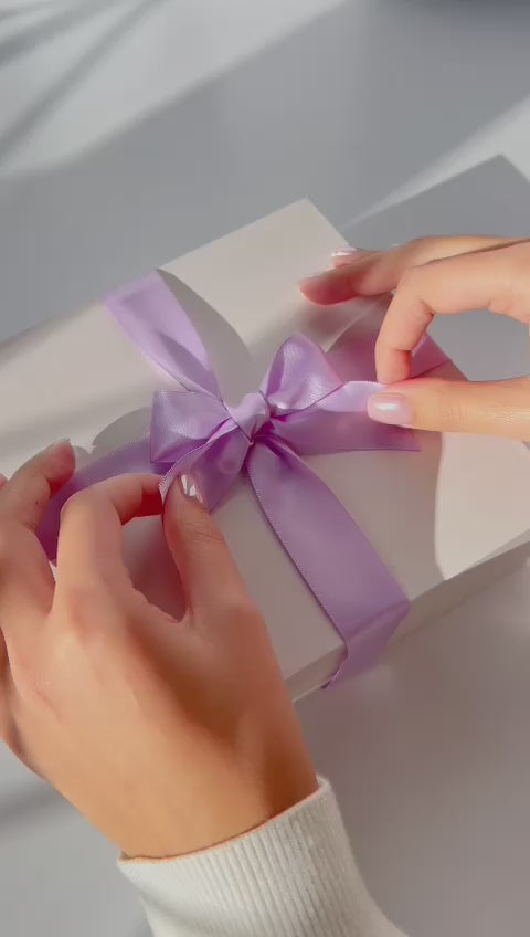 Video showing what’s inside the teacher appreciation gift box – lavender candle, floral bath treats, and packaging