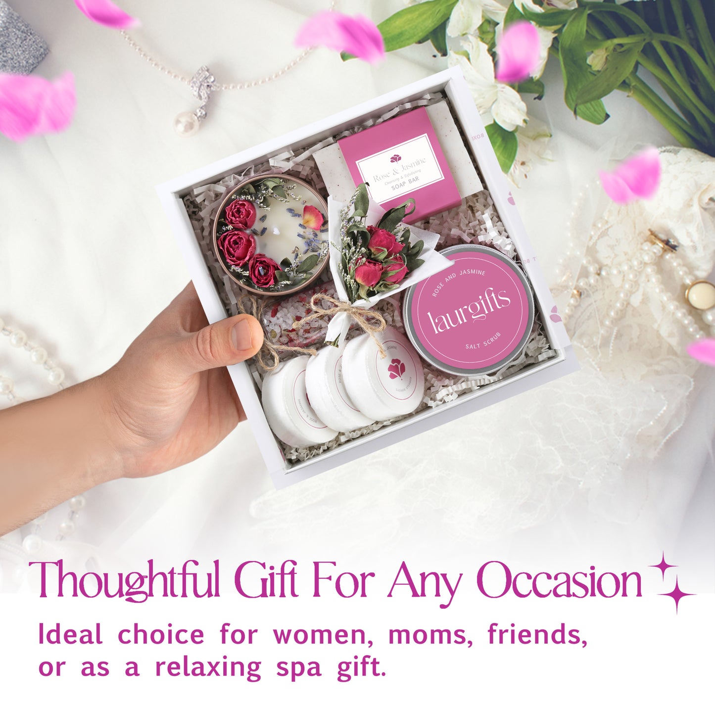 Gift set with flowers and candles in a box, labeled 'lauralill', on a white surface with decorative elements.