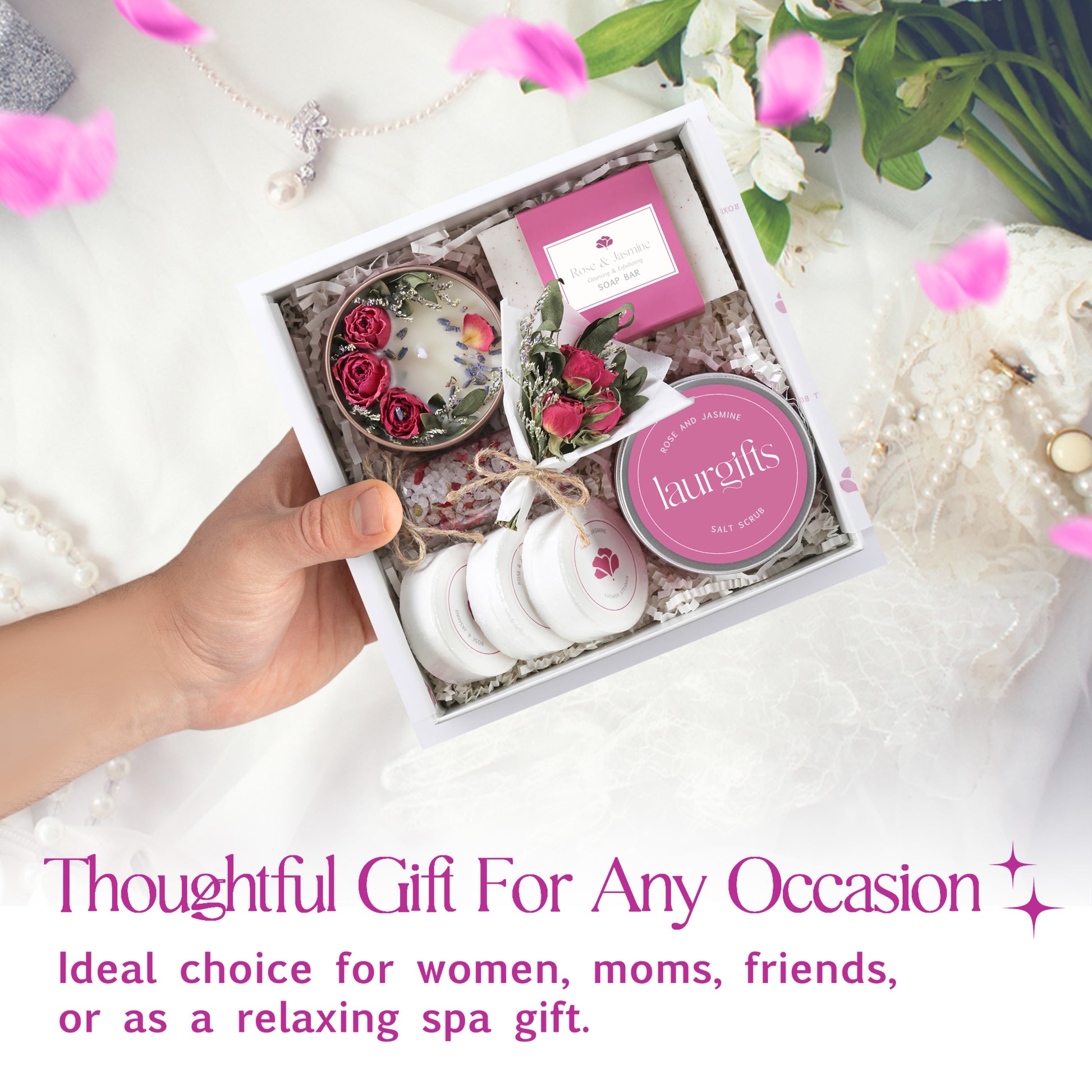 Gift set with flowers and candles in a box, labeled 'lauralill', on a white surface with decorative elements.