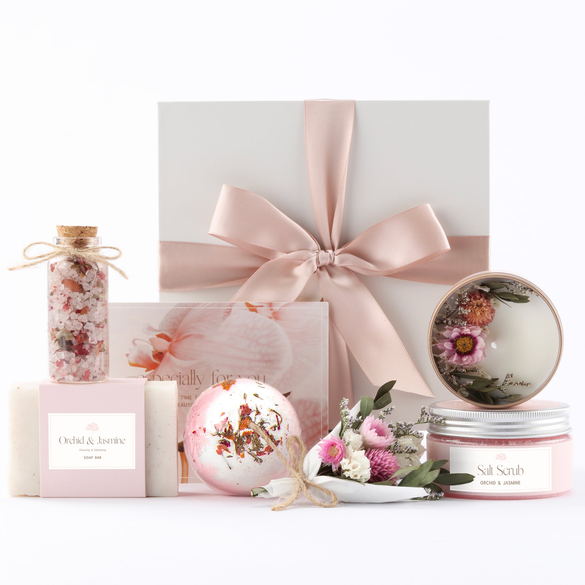 Vertical display of spa gift box items for mom – includes floral candle, soap, bath bomb, and bath salts