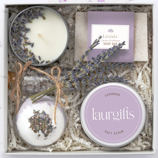 Lavender spa gift box with candle, soap, bath bomb, scrub, and dried flowers
